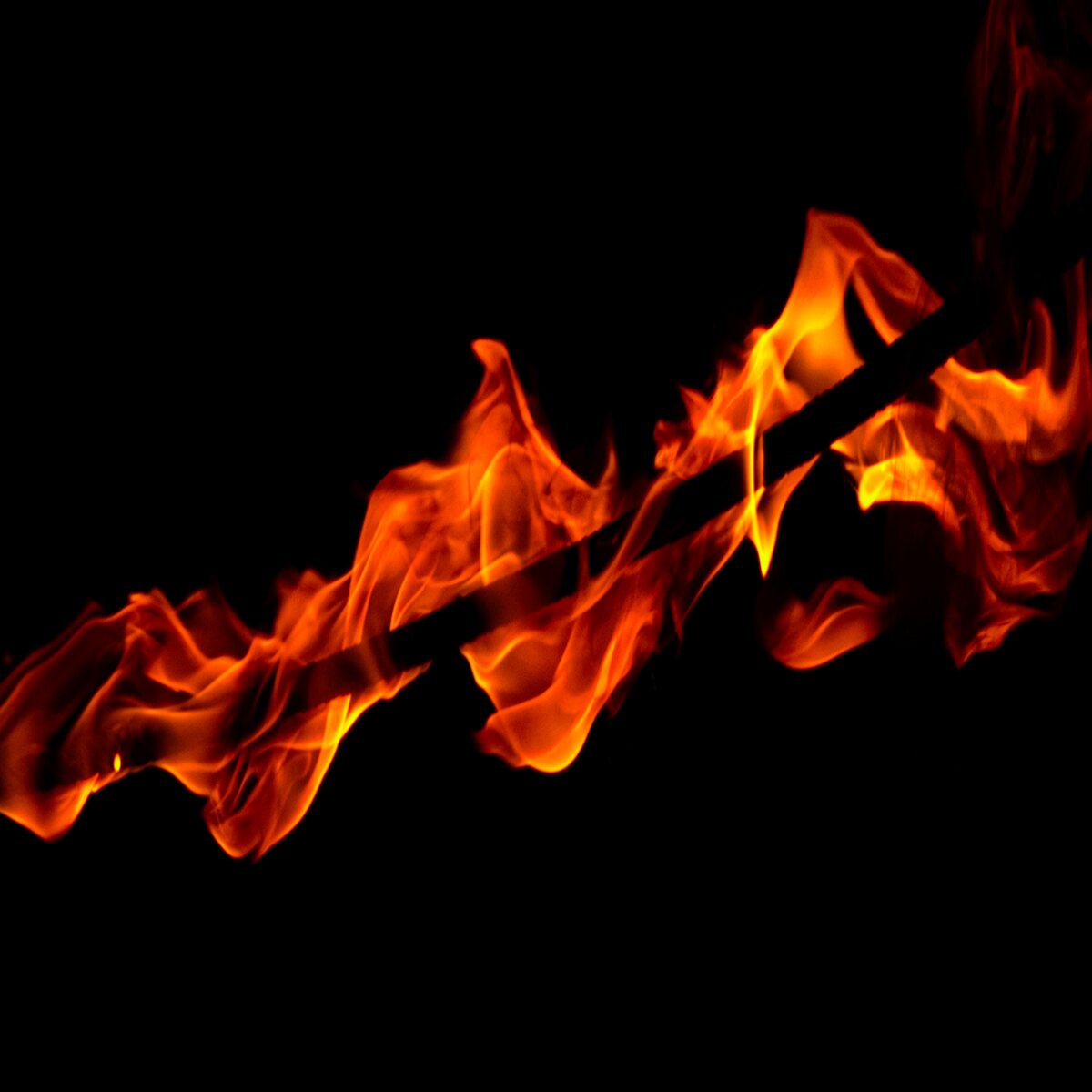 Flame against a dark background
